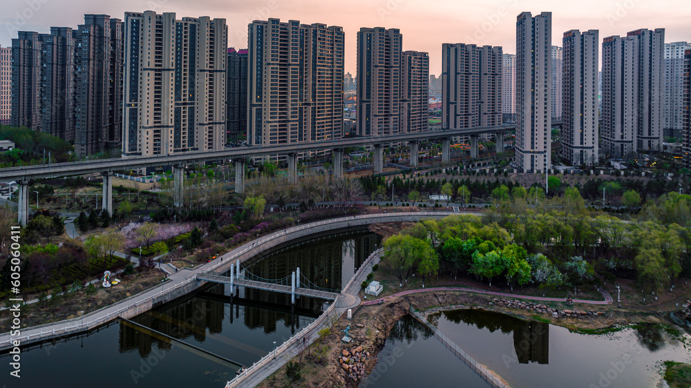 Naklejka premium Landscape of buildings along the Yitong River in Changchun, China