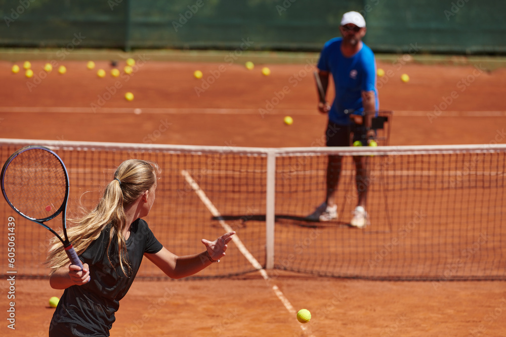 A professional tennis player and her coach training on a sunny day at the tennis court. Training and preparation of a professional tennis player