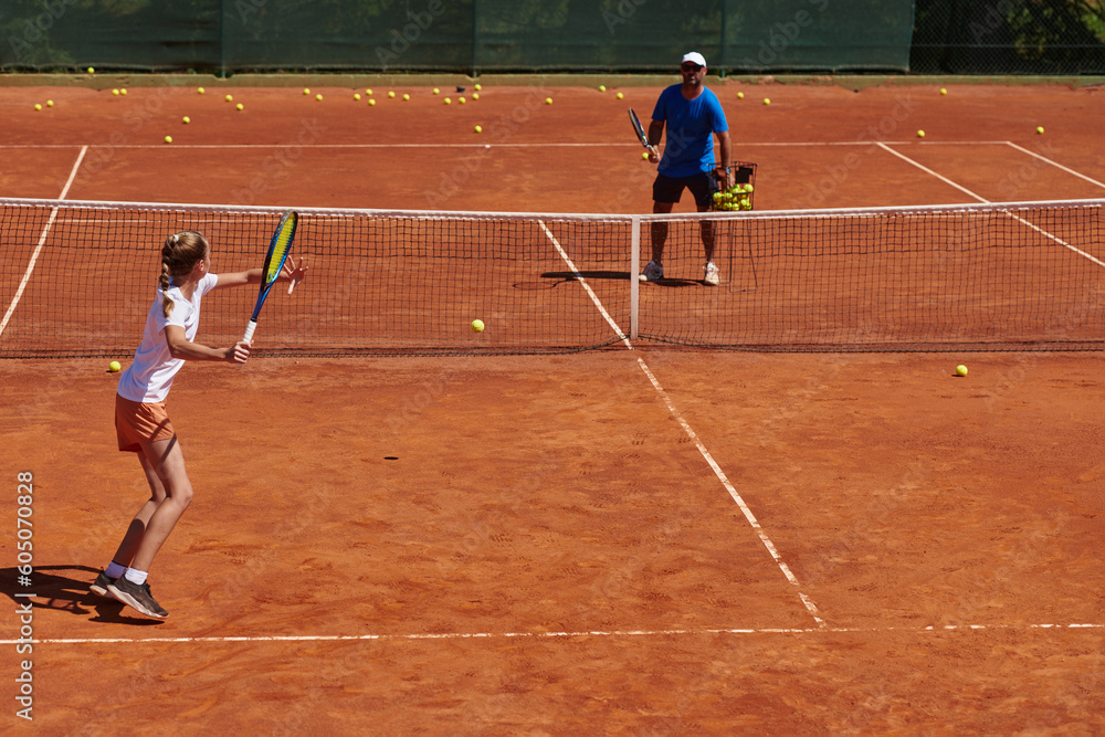 A professional tennis player and her coach training on a sunny day at the tennis court. Training and preparation of a professional tennis player