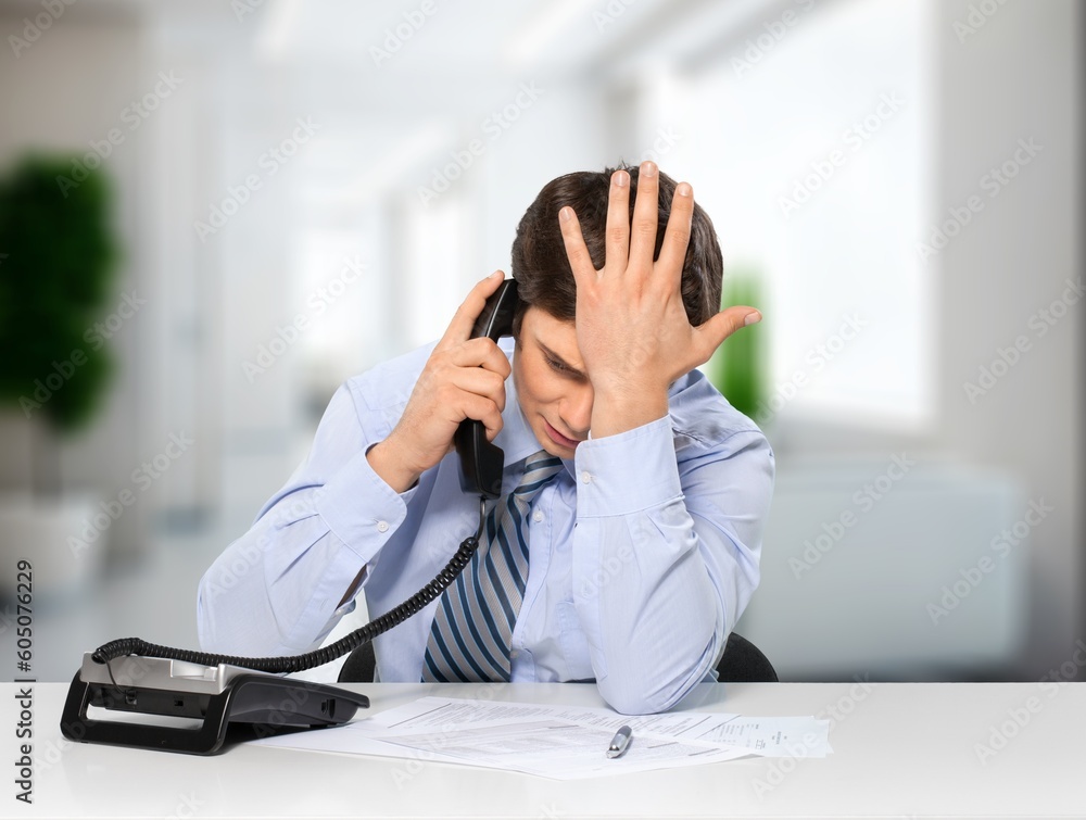 Stress, business man with headache working in office Stress, business man with headache working in office