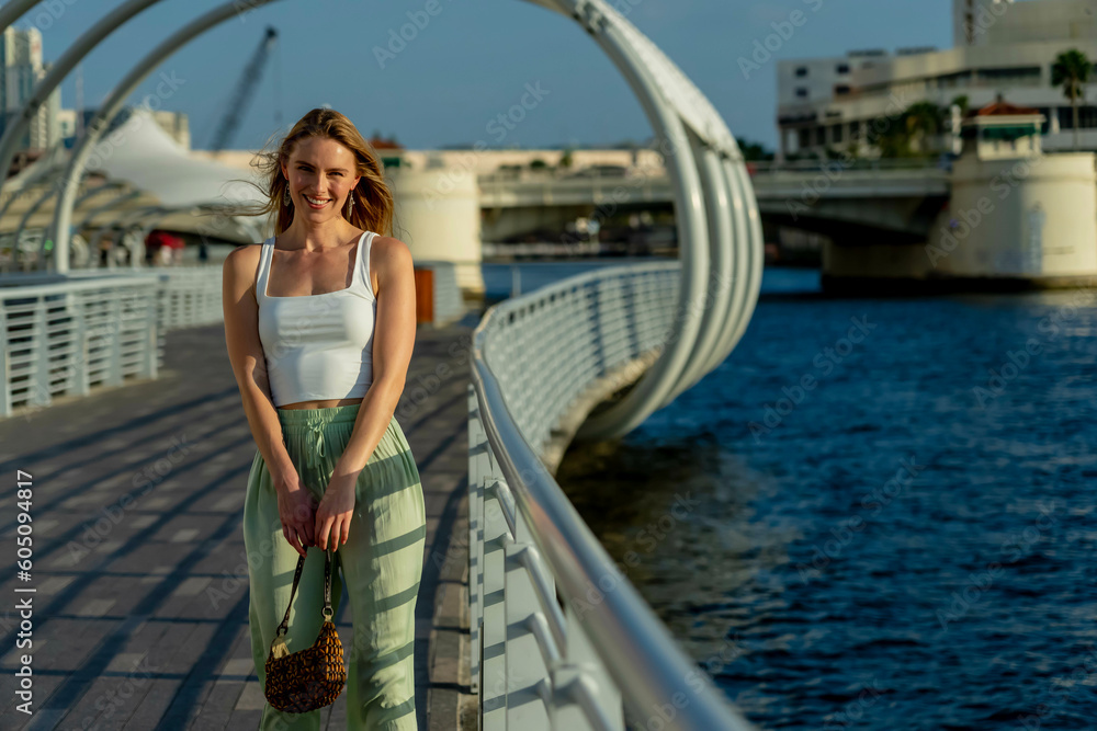 A Lovely Blonde Model Enjoys The Summer Weather In An Urban Environment A Lovely Blonde Model Enjoys The Summer Weather In An Urban Environment