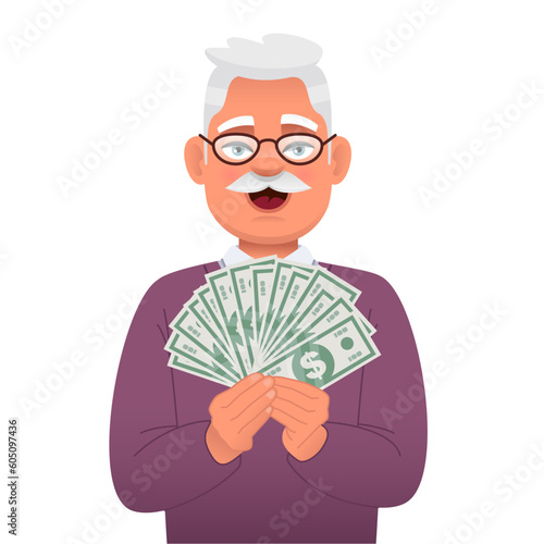 Grandfather is happy to win the lottery. A handsome old gray-haired man with money in his hands. An elderly man holds dollar bills in his hands. A happy businessman.