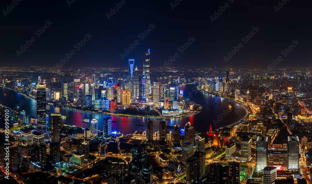 Aerial view of city skyline and modern buildings in Shanghai at night, China.