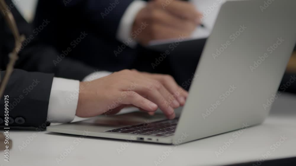 Consult Judge or lawyer Hand Writing Document in Court Room. Consult Judge or lawyer Hand Writing Document in Court Room.