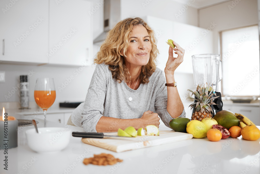 Portrait, fruit salad and apple with a senior woman in the kitchen of her home for health, diet or nutrition. Smile, food and cooking with a happy mature female pension eating healthy in the house - obrazy, fototapety, plakaty 