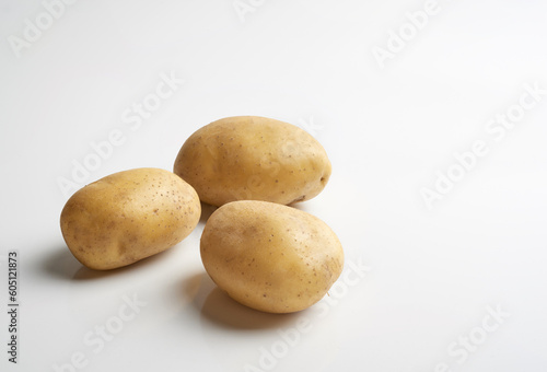 Raw potatos isoalted on white background