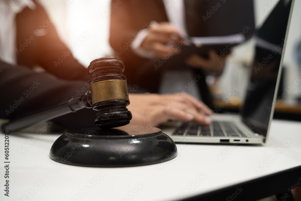 Judge gavel with Justice lawyers having team Concepts of Law and Legal services Judge gavel with Justice lawyers having team Concepts of Law and Legal services
