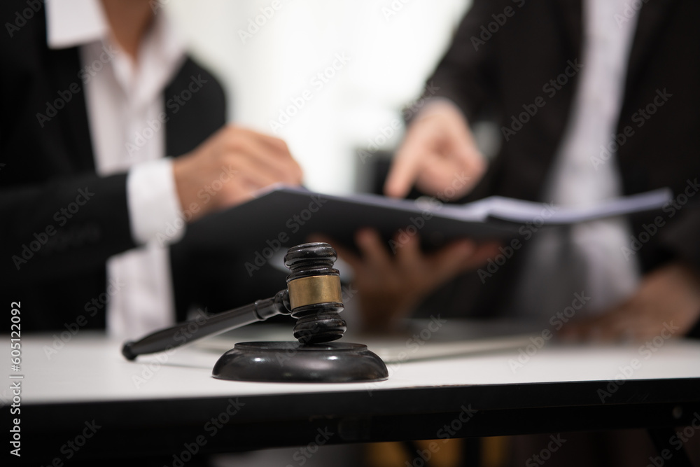 Judge gavel with Justice lawyers having team Concepts of Law and Legal services Judge gavel with Justice lawyers having team Concepts of Law and Legal services