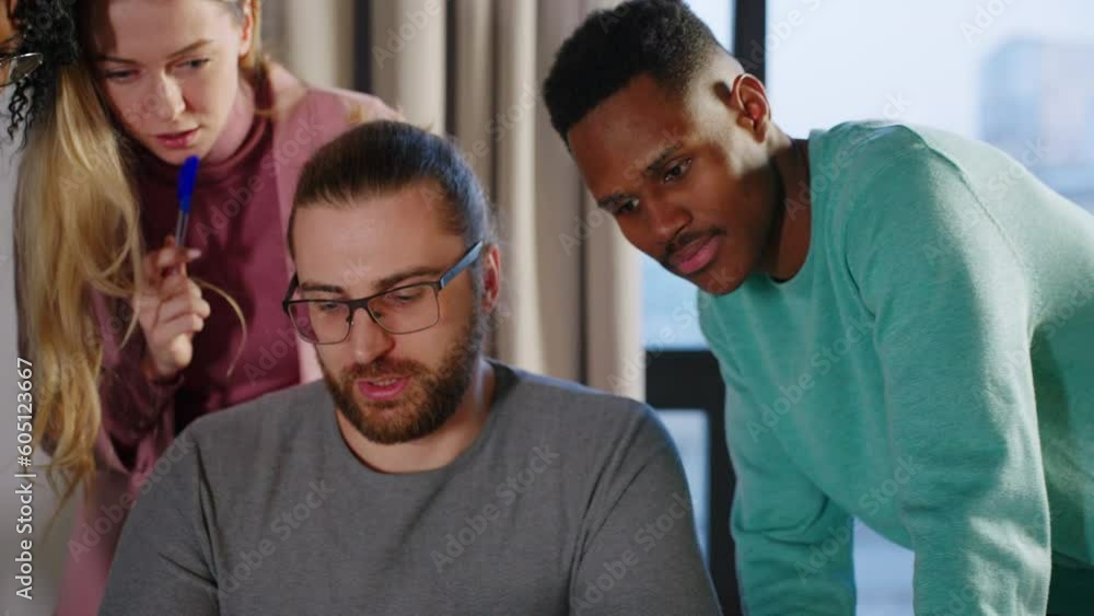 Office workers creative team are talking then doing high-five hand gesture working together around table. Office workers creative team are talking then doing high-five hand gesture working together around table.