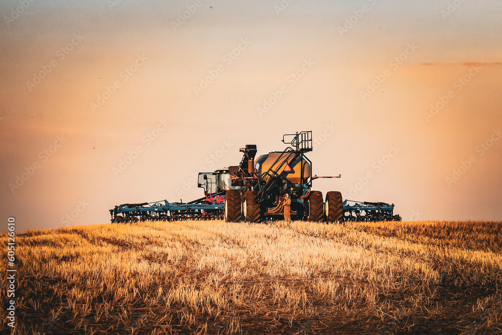 Obraz premium combine harvester on field