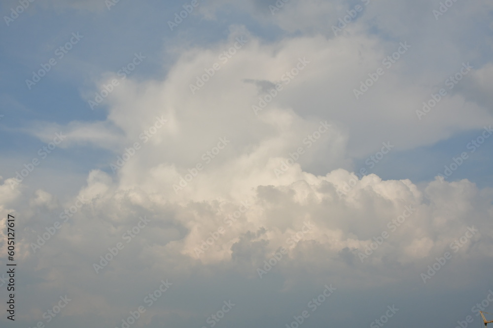 Big cumulus clouds befor summer rain with sunlight