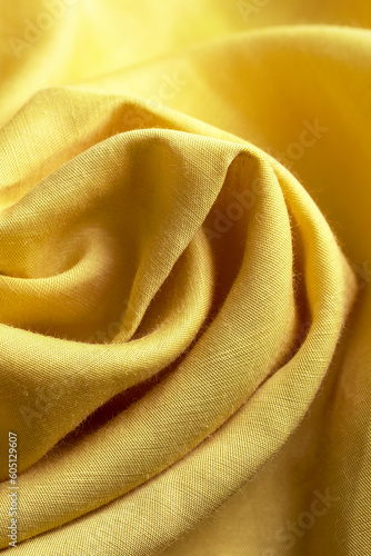 Lima oliva yellow trendy color of lyocell fabric. Modern fashion texture for quality clothing swatch