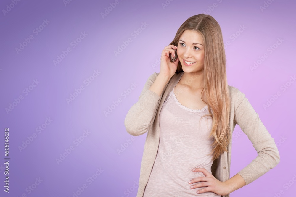 Smiling young woman hold mobile phone Smiling young woman hold mobile phone
