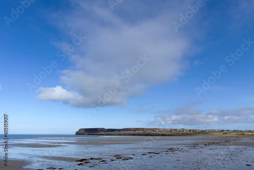 Coast Dunnet Head Nothern Scotland. Coast Northsea . Beach, clouds and cliffs