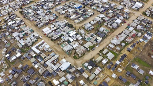 Township, drone and shack buildings in South Africa, Gugulethu or neighborhood outdoor. Aerial view, slums and area, land or landscape with poverty, infrastructure and poor village, street or shanty.