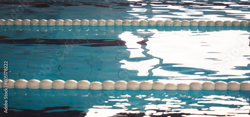 Indoor swimming pool with swim lanes.