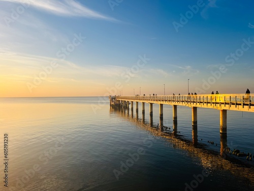 Old big pier at the sea  sunset seascape sky 