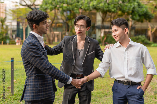 A young asian man gets two former friends and now enemies to shake hands, reconcile and call a truce. A great friend acting as a mediator to patch things up.