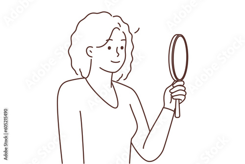 Smiling black woman look in mirror loving reflection 
