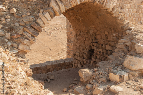 Jordan. Majestic and impregnable fortress of El-Karak or "Fortress of Crow" was built by crusaders in 1162.Crusader castle El-Karak. Arches of windows in fortress wall for observation and defense.