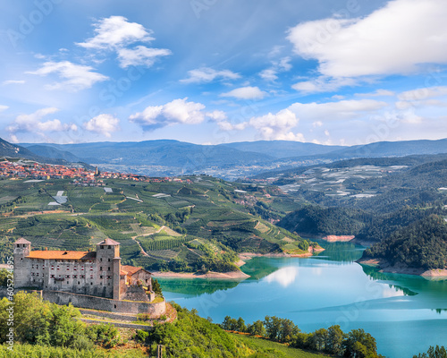 Fabulous View of the Cles Castel, the Santa Giustina Lake and lots of apple plantations.