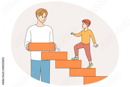 Loving father building stairs to walk for son