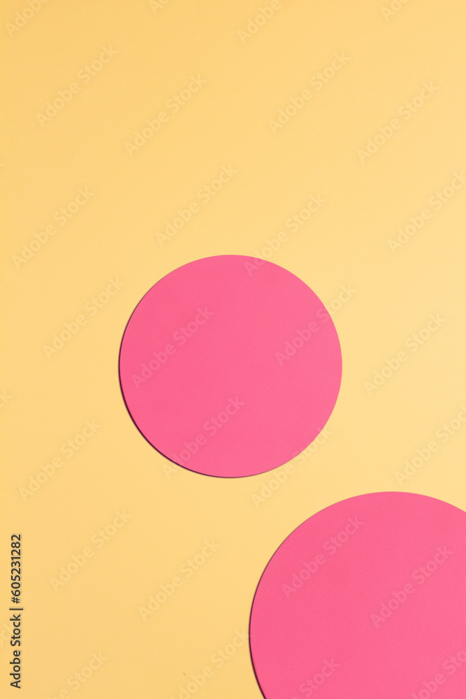Paper yellow background with pink circles. Paper yellow background with pink circles.