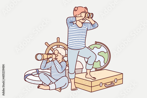 Children play sailors with vintage nautical things and dream of becoming travelers