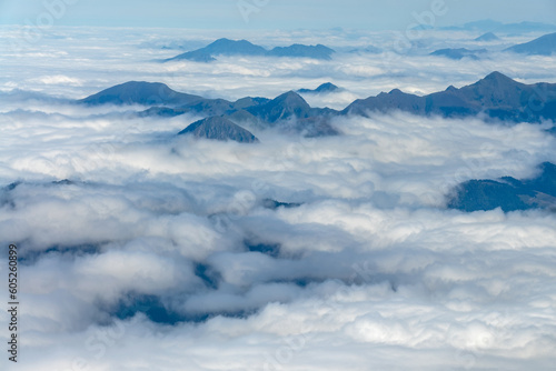 Mountain peaks above the clouds. View from the Pic du Midi de Bigorre in the Pyrenees, France