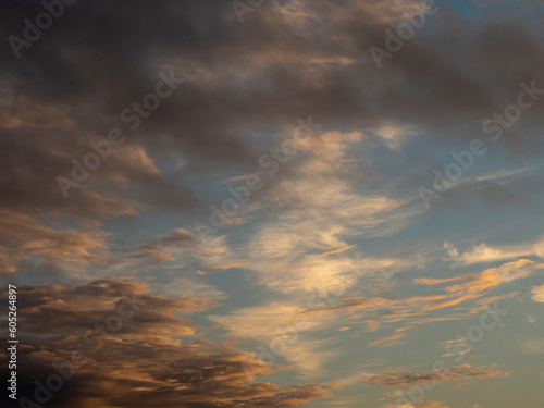 Calm sunset sky with clouds, Nature background for design and sky replacement.