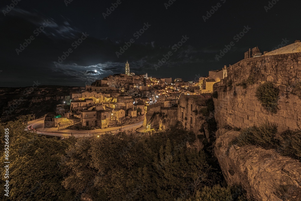 Stunning aerial view of the historic Matera skyline illuminated by lights