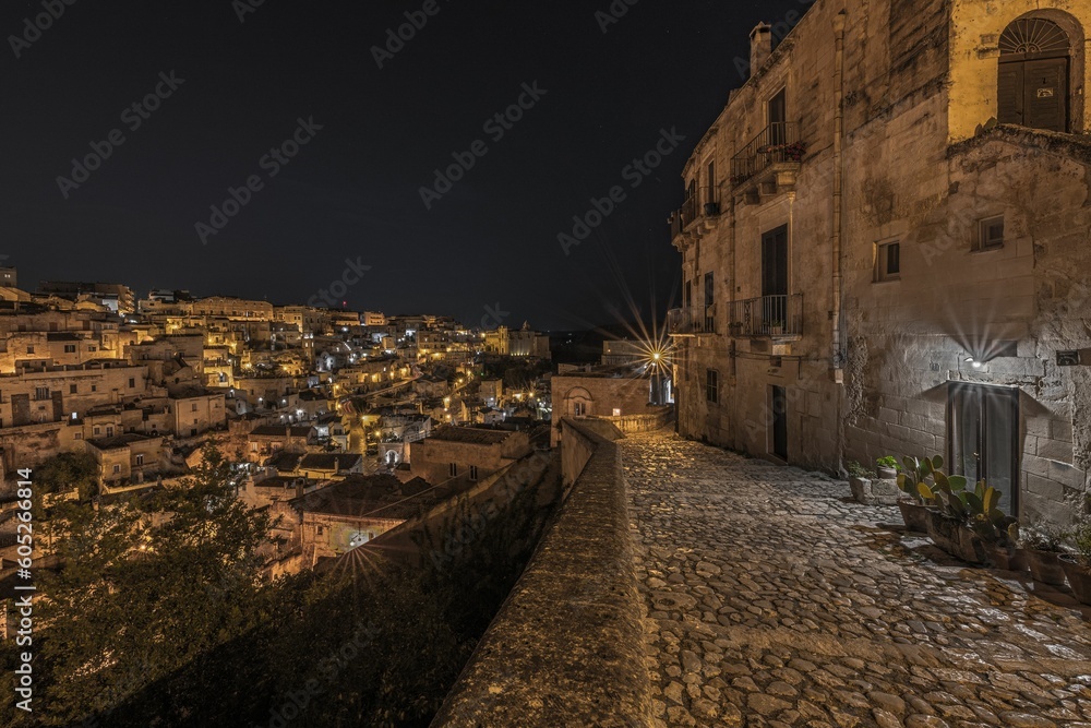 Stunning aerial view of the historic Matera skyline illuminated by lights