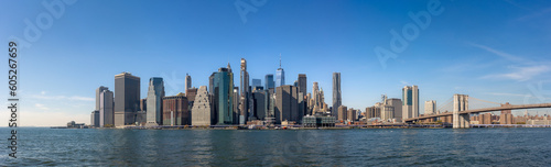 panorama Manhattan and Brooklyn bridge with blue sky in New York City © Africa2008