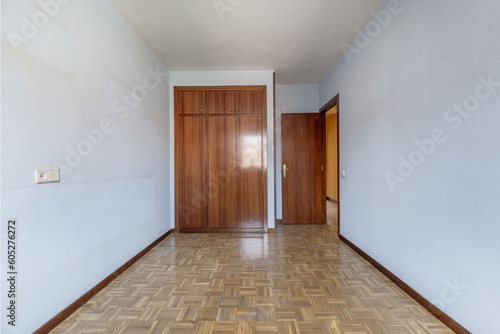 Wallpaper Mural An empty room with a built-in wardrobe with three-section varnished Torontodigital.ca