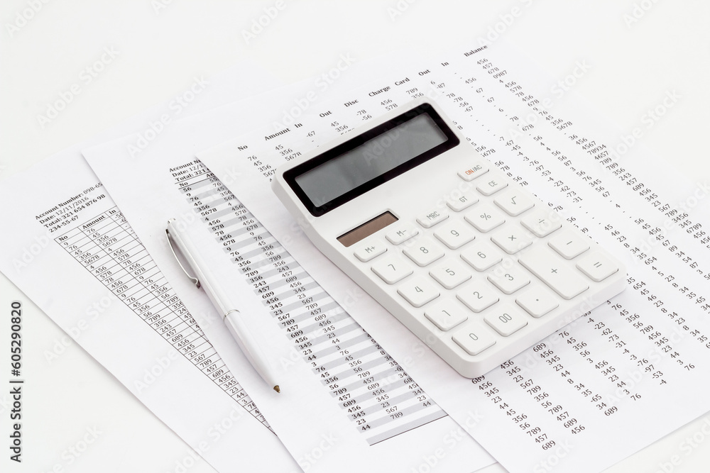 Financial accounting analisis with calculator on office table, top view Financial accounting analisis with calculator on office table, top view