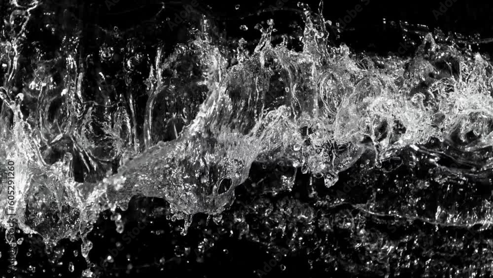 Super Slow Motion of Dark Water Waves in Detail. Filmed on High Speed Cinema Camera, 1000 fps. Top Shot Composition, Isolated on Black Background. Super Slow Motion of Dark Water Waves in Detail. Filmed on High Speed Cinema Camera, 1000 fps. Top Shot Composition, Isolated on Black Background.