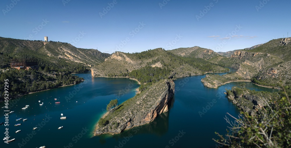 Scenic aerial view of the lake of Bolarque 
surrounded by lush green hills, Mexcio