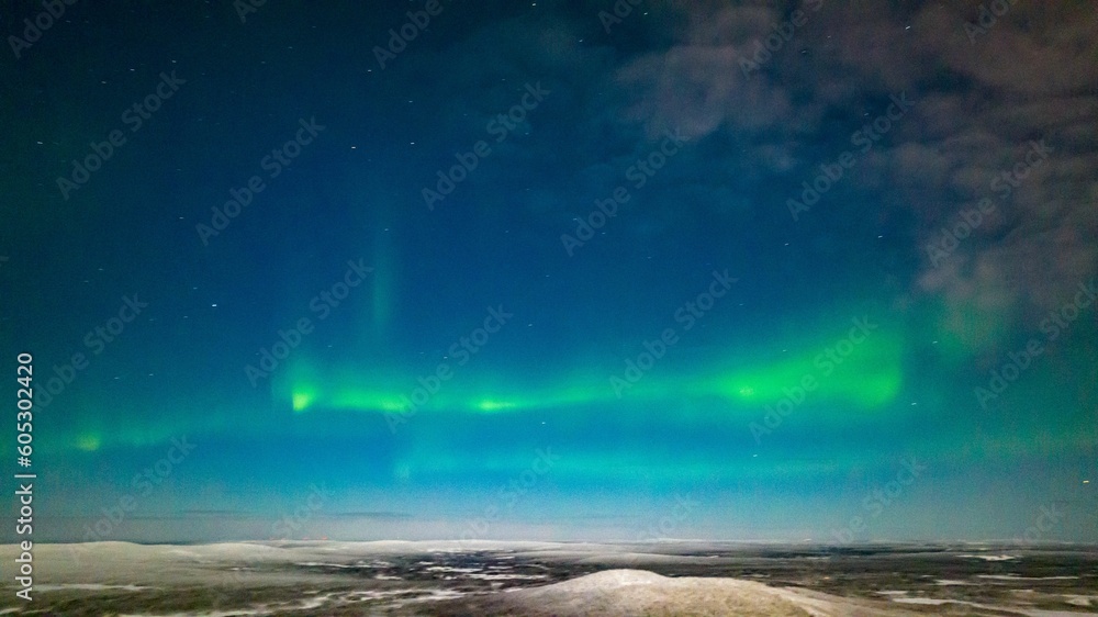Northern lights, in moon light, winter night in Lapland 01