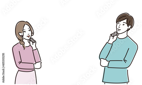 向き合って考える男女