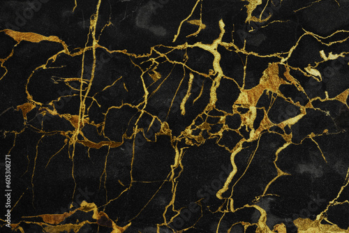 Beautiful black and gold marble surface as background