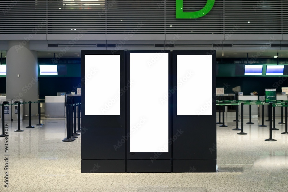 Three bright white empty panels at the airport. Copy space.