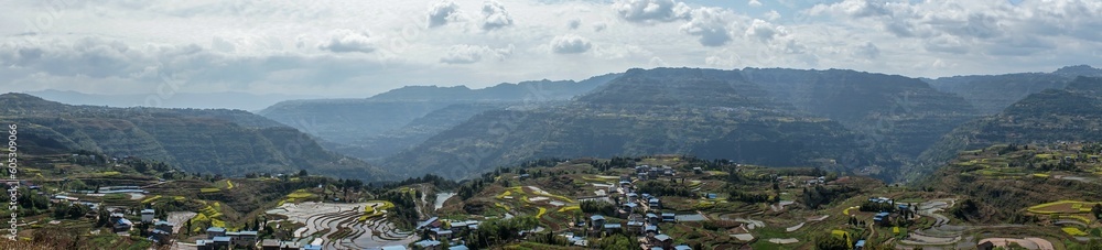 Aerial view of a village and vast landscape in the countryside