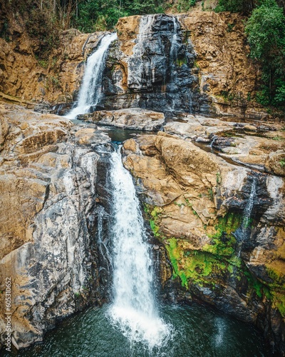 Beautiful scene of small waterfalls, Perez Zeledon, Costa Rica, vertical photo