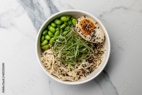 Closeup of bowl with different ingredients in white background