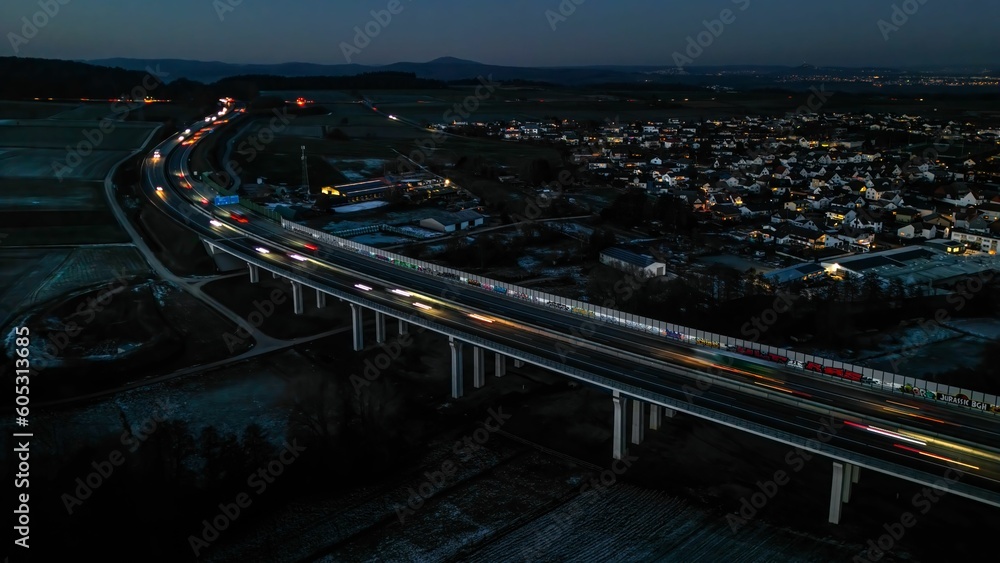 high angle view of traffic on highway bridge at night