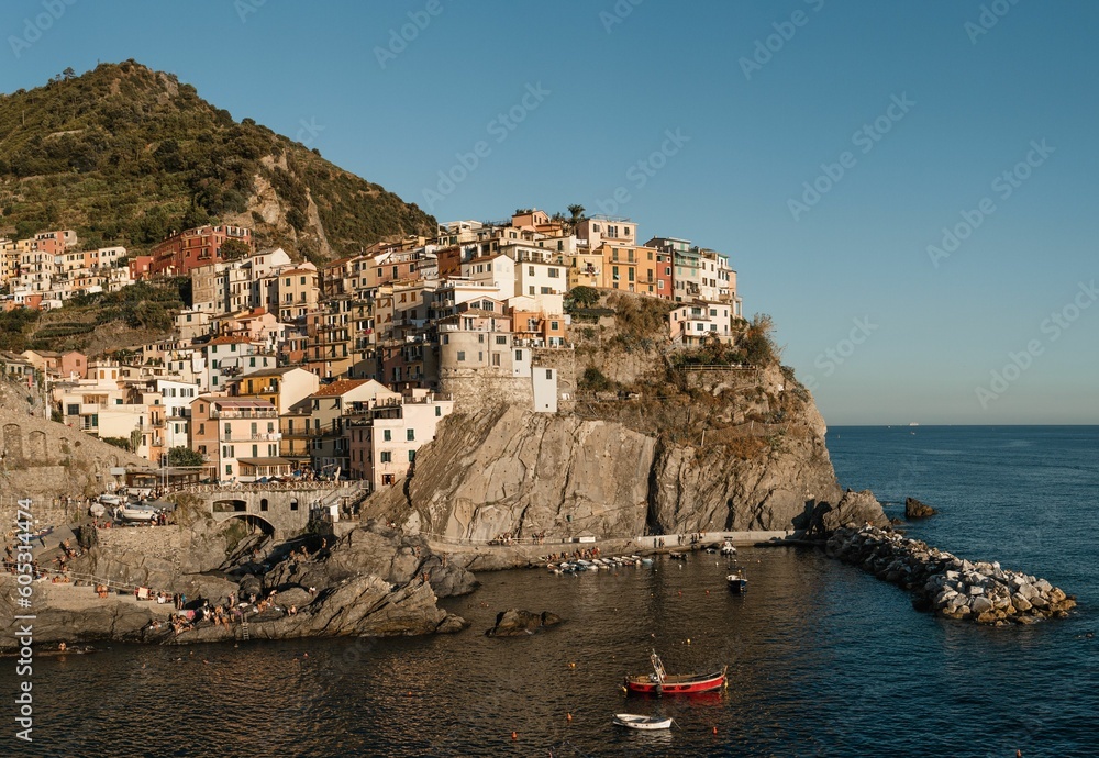 Natural view of a coastal village and cliff in Manarola, Cinque Terre, Italy