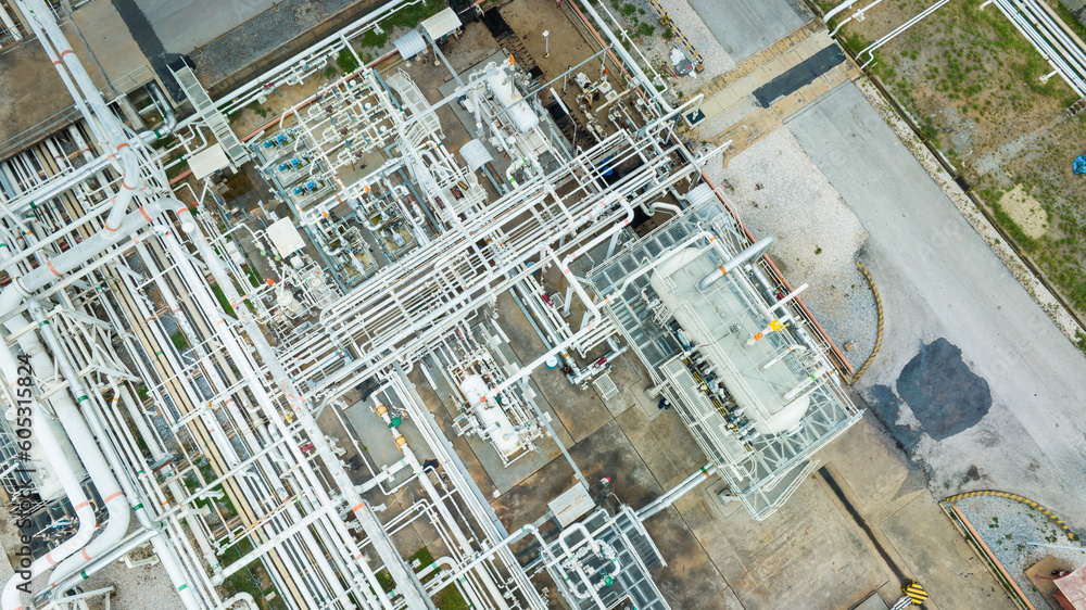Obraz premium Top view steel long pipes and valve pipe elbow in station oil factory