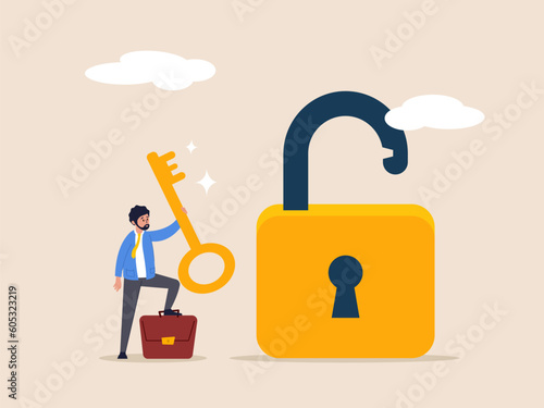 Success business concept. Golden key to unlock, solve business problem, professional to give solutions, key or unlock business accessibility, smart businessman holding golden key to unlock the pad.