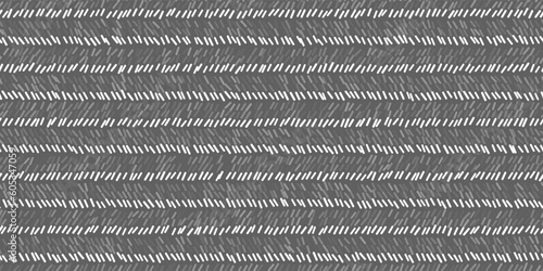 Pinstripe grey and white seamless pattern with sketchy lines and texture. Classic wool suit fabric. Elegant masculine design. Simple monochrome background. Twill variegated woolen material