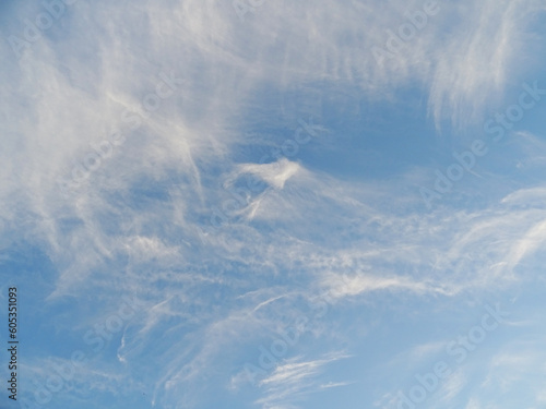 Translucent clouds in a blue sky, cirrus clouds on a sunny day